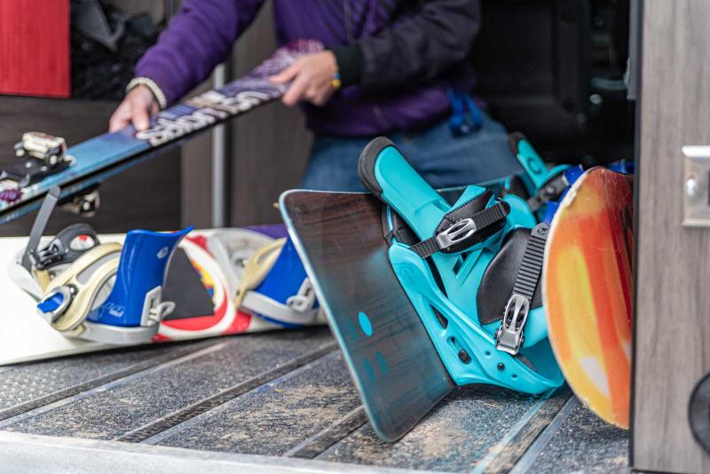 Snowboards in the back of an Antero Adventure Van